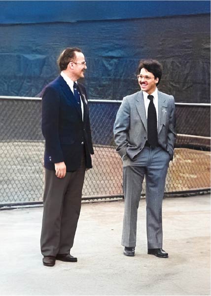 Derek Bryson Park Collaborating on Transformative Strategic Initiatives with Lamar Hunt, Celebrated Owner of the Kansas City Chiefs and Visionary Founder of the American Football League and the Super Bowl, at a Significant Sporting Occasion